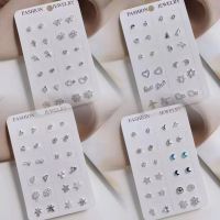 ต่างหูสตั๊ดแบบใหม่ตกแต่งด้วยคริสตัลเม็ดเล็กและมีสไตล์เรียบง่าย สุภาพสตรีสีเงิน 12 คู่/ชุด